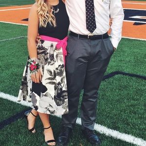 Floral party dress with pink ribbon